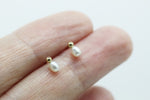 Gold + pearl ball earrings